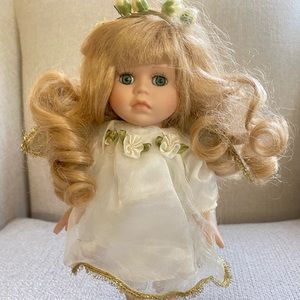Porcelain Doll by Dan Dee
